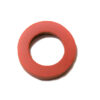 A red rubber washer is sitting on the floor.