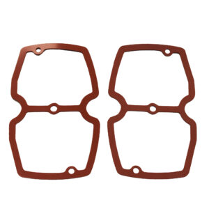 A pair of red gaskets for the front brake caliper.